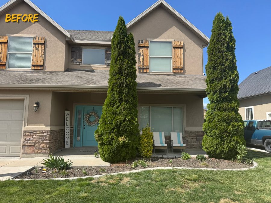 front exterior of stucco house with wooden shutters showing extreme paint wear Preview Image 2