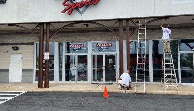 Sporting Gym Storefront at Trainer's Station Shopping Center during exterior painting project by CertaPro Quakertown