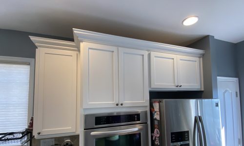 White Kitchen Cabinets in Coopersburg, PA after being repainted by CertaPro Quakertown, PA