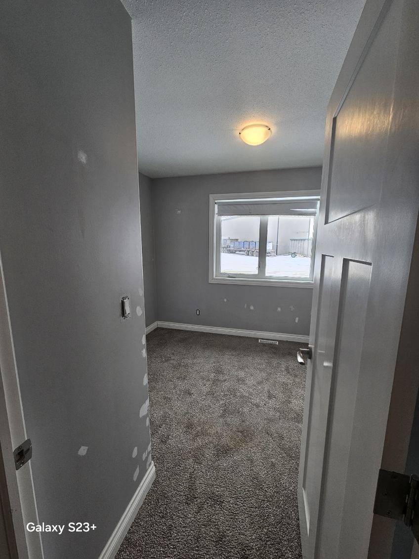 house interior with gray painted walls and repair patches Preview Image 8