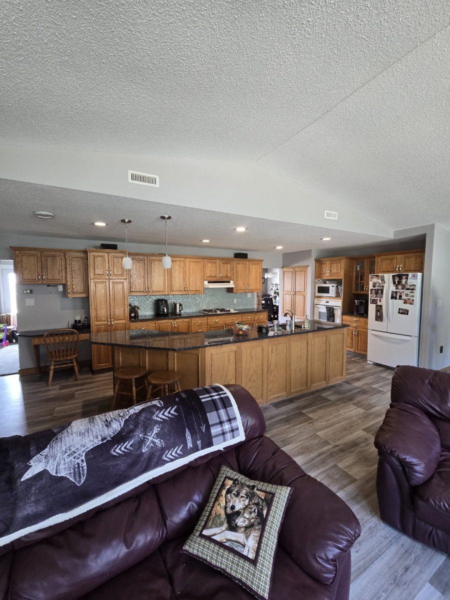 kitchen with natural wooden cabinetry before repaint Preview Image 4