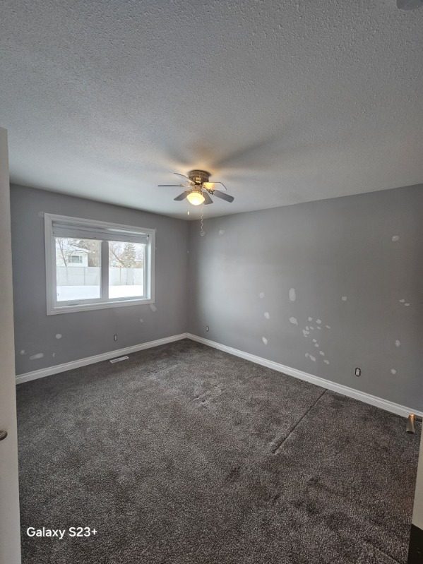 house interior with gray painted walls and repair patches Preview Image 10