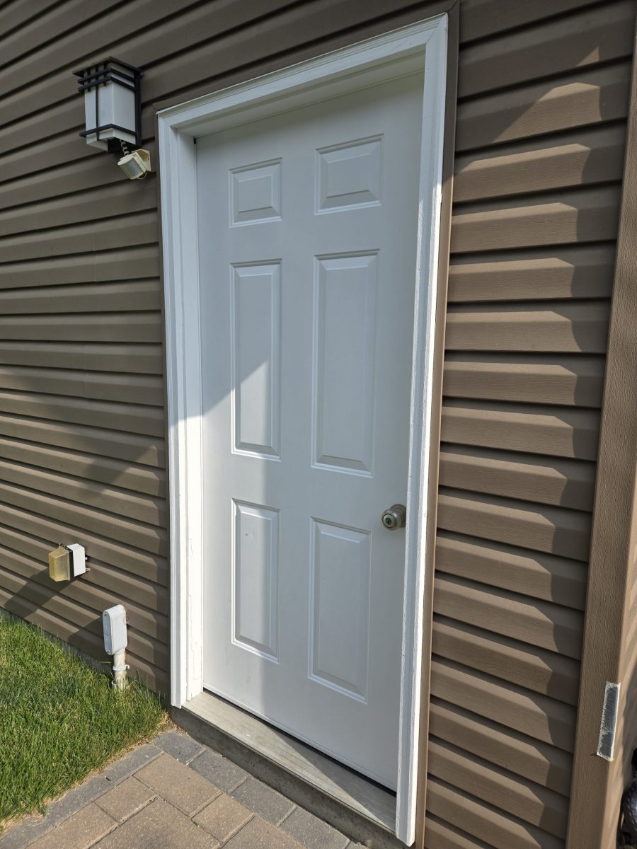 exterior house door and painted vinyl siding Preview Image 1