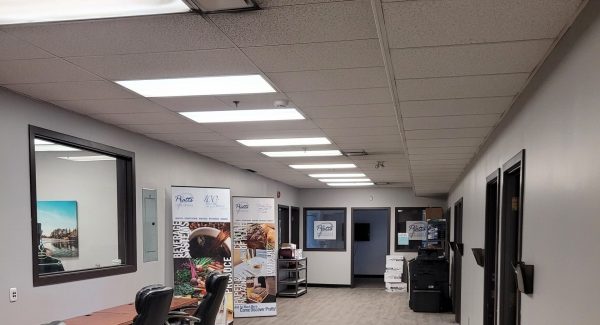 office area with desk and chairs