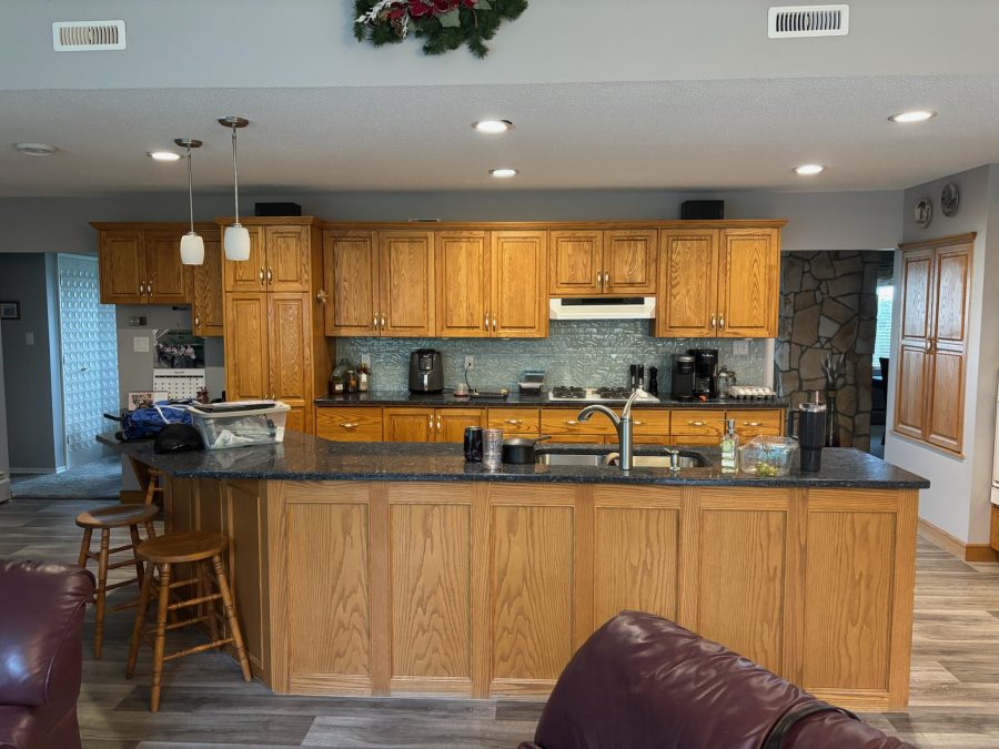 kitchen with natural wooden cabinetry before repaint Preview Image 5