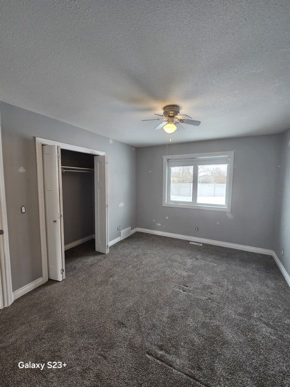 house interior with gray painted walls and repair patches Preview Image 9