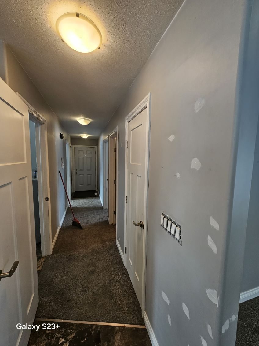 house interior with gray painted walls and repair patches Preview Image 12