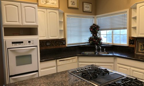 Kitchen Cabinets refinished to perfection.