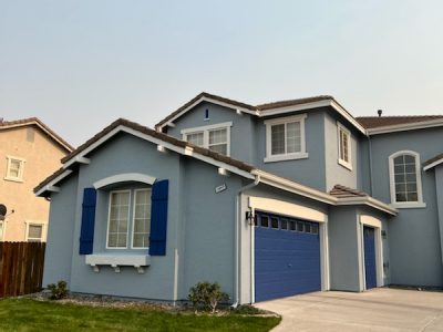 blue stucco home in sparks nevada painted by certapro painters