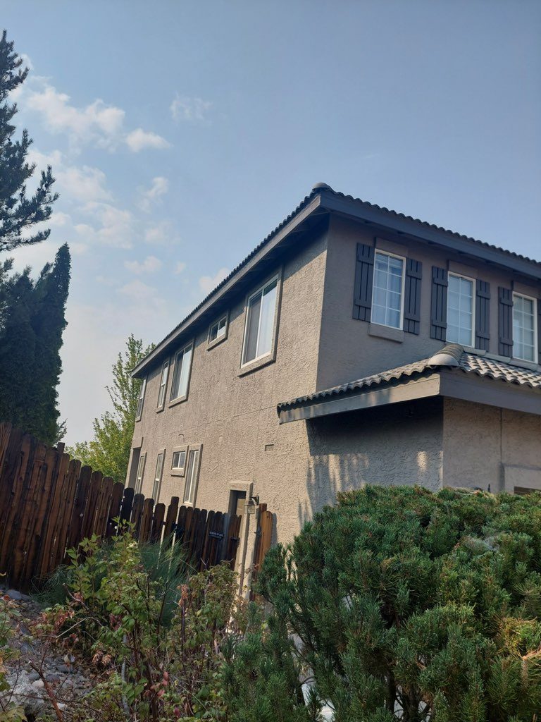 left side of reno home exterior painted by certapro painters Preview Image 3