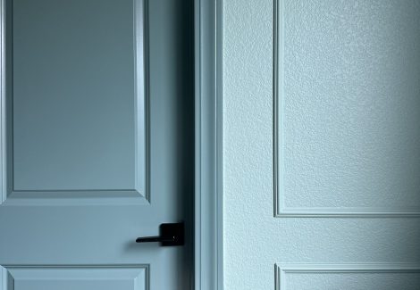 textured wall finish painted in blue.