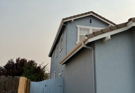 side view of blue stucco home in sparks, nevada painted by certapro painters