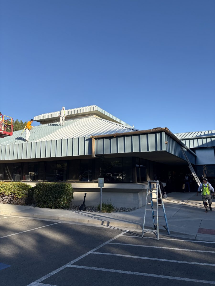 painters in boom lift working on commercial roof Preview Image 2