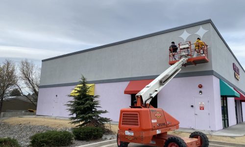 Applying stencils and painting.