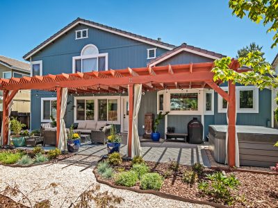 Pergola stained and house exterior repainted in Reno.