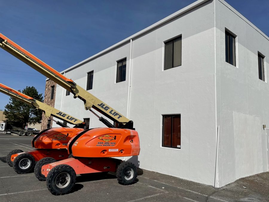 Building exterior with hydraulic boom lifts. Preview Image 2