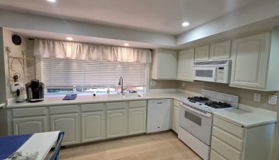 home kitchen with painted cabinets