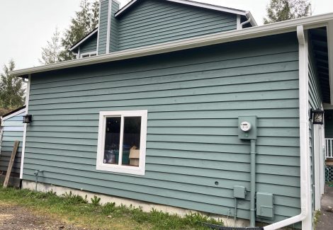 Wood Siding Repainted from gray to green
