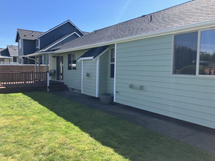 house exterior with light green siding Preview Image 1