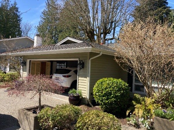 front exterior of home garage before siding repaint Preview Image 2