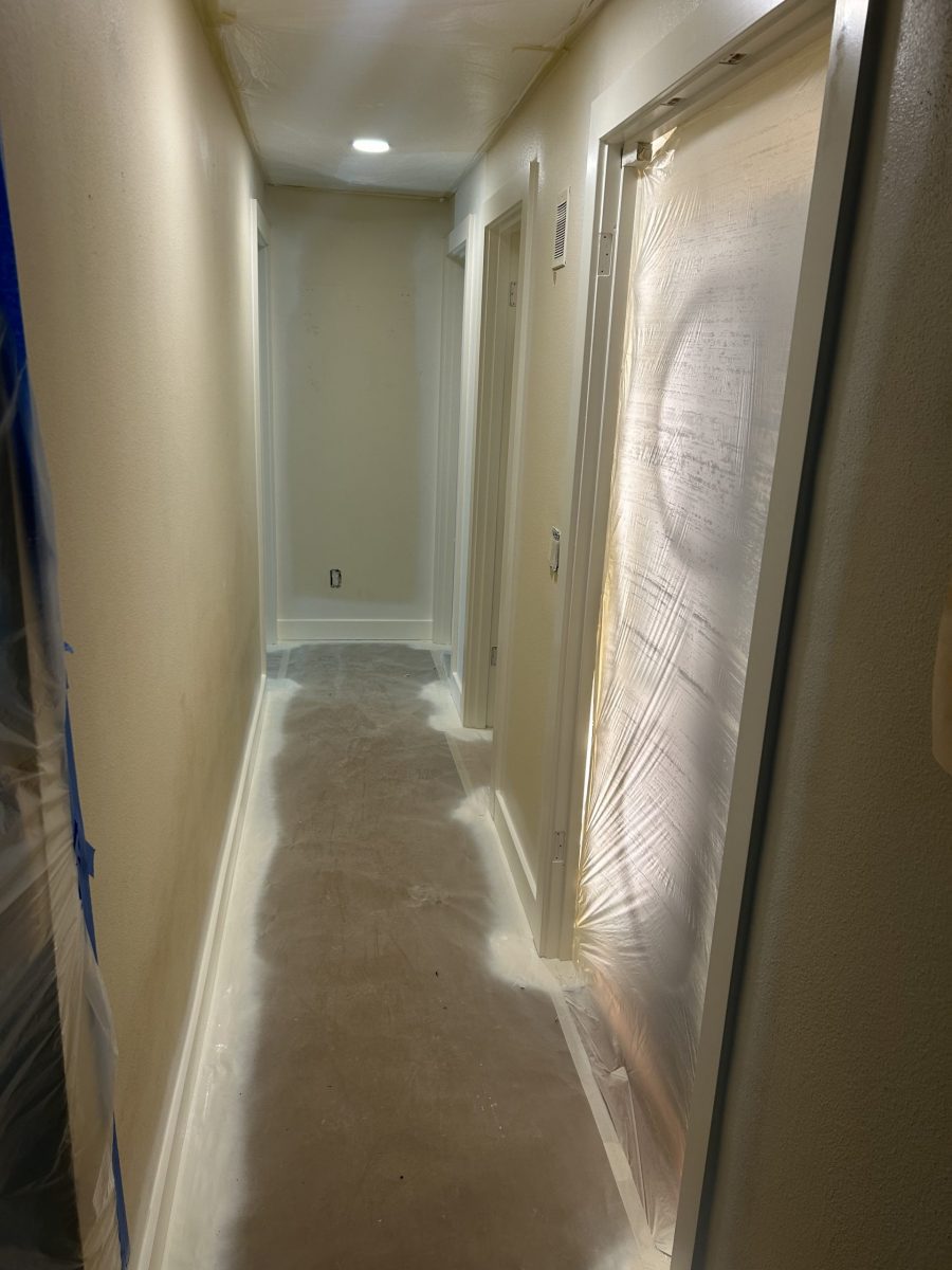 hallway with protective coverings for painting Preview Image 13