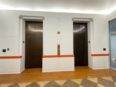 A Directional Red line Painted to Highlight the Elevators