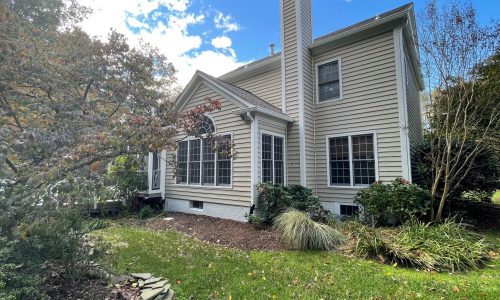 Repainting the exterior house with a beige color