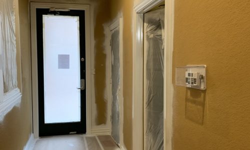 Prepped hallway painting in progress