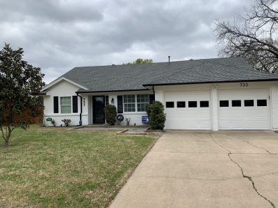 brick home painted white in richardson, TX