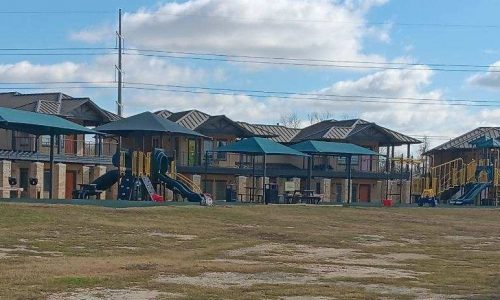 Front View of Complex w/ Playground