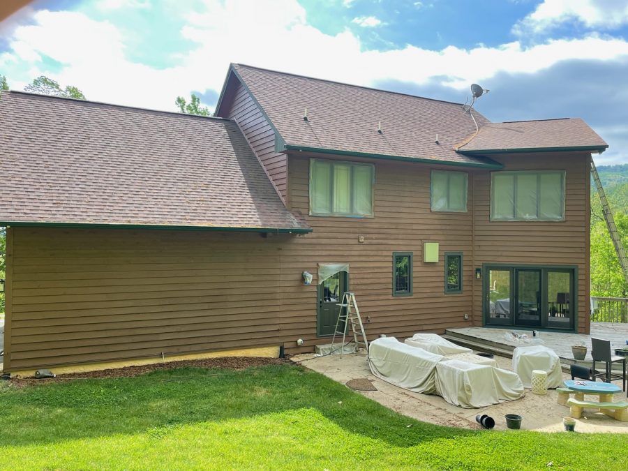 back of residential house exterior during painting Preview Image 4