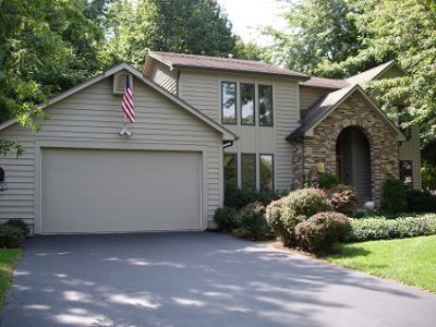 Exterior house painting by CertaPro painters in Pittsford, NY