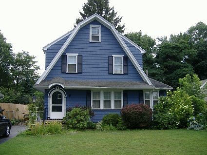 Exterior house painting by CertaPro painters in Rochester, NY