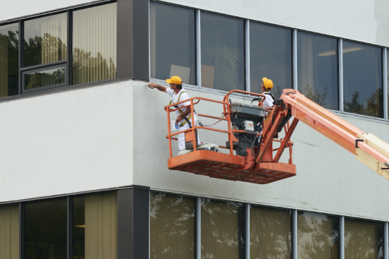 certapro painters on a lift commercial painting