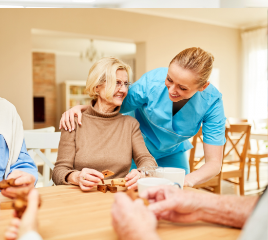 Patient and nurse in senior living facility after painting