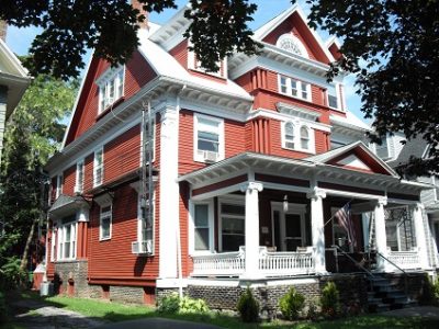 Exterior house painting by CertaPro painters in Rochester, NY