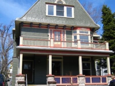 Exterior house painting by CertaPro painters in Rochester, NY