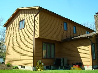Exterior painting by CertaPro house painters in Fairport, NY