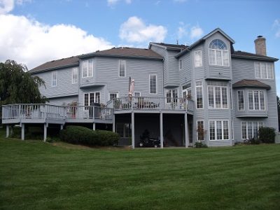 Exterior house painting by CertaPro painters in Pittsford, NY