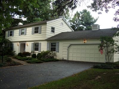 Exterior house painting by CertaPro painters in Pittsford, NY