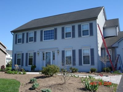 Exterior painting by CertaPro house painters in Fairport, NY