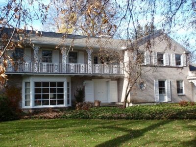Exterior house painting by CertaPro painters in Rochester, NY