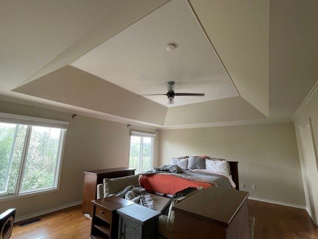 Master Bedroom painted tan with vaulted ceiling. Preview Image 3