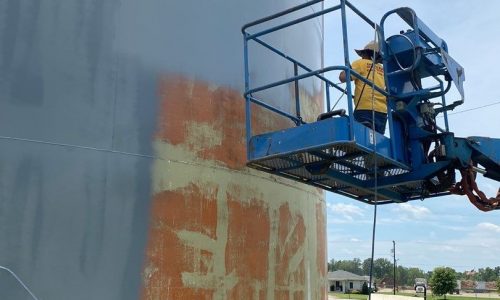 Painting The Sides Of The Water Tank