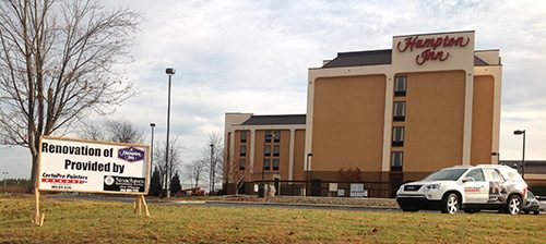 side view of hampton inn painting