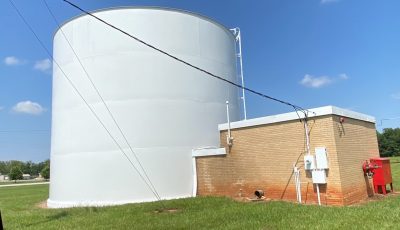 Brand new paint on a 50 year old water tank.