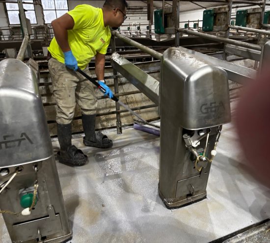 Gill Dairy Case Study floor being smoothed behind equipment