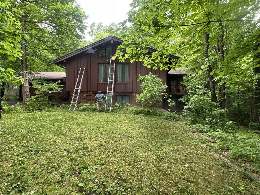 person power washing exterior of house Preview Image 5