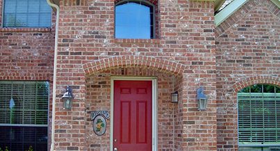 Brick and Red Door Home