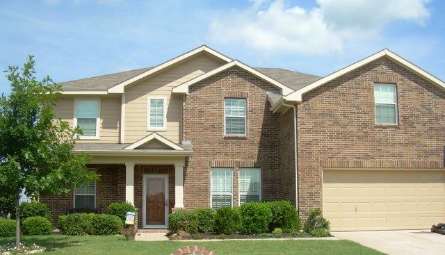 Brick exterior painting in Rockwall Texas.
